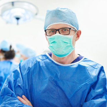 A doctor wearing medical scrubs.